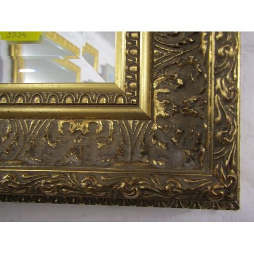 468 - BEVEL EDGED MIRROR, rectangular form bevel edge mirror, in ornate gilt frame, 96cm