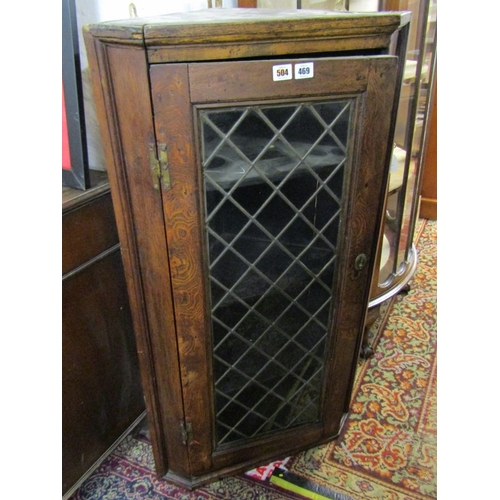 469 - CORNER CUPBOARD, leaded glass hanging oak corner cupboard