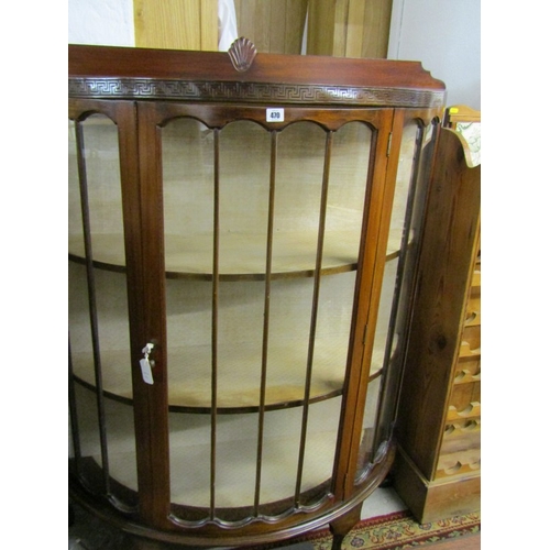 470 - MAHOGANY VENEERED DISPLAY CABINET, of bowed form, fitted 2 shelves on ball and claw feet, 36cm width