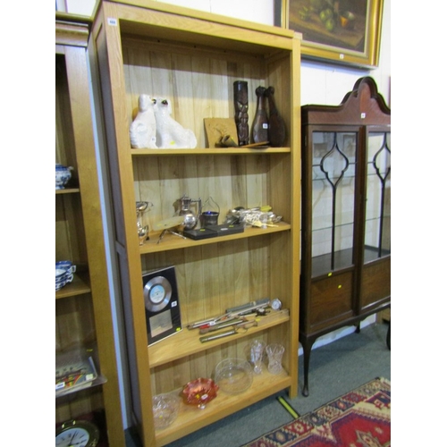 488 - MODERN LIGHT OAK BOOKCASE, 202cms high, 95cms wide ( bottom right hand corner cut out for a plug)