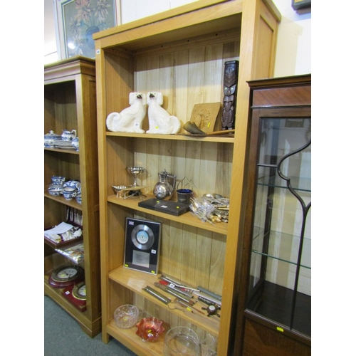 488 - MODERN LIGHT OAK BOOKCASE, 202cms high, 95cms wide ( bottom right hand corner cut out for a plug)