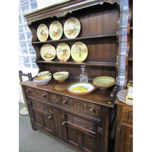 493 - OAK DRESSER, carved oak dresser with 2 open shelves above, 2 carved drawers with cupboard to base, 1... 