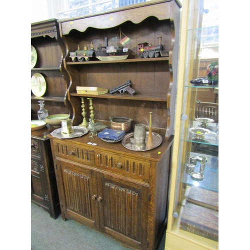 494 - OAK NARROW DRESSER with linen fold panelled cupboard base