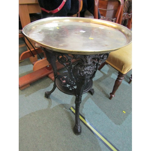 502 - CAST IRON BASE PUB TABLE, with added brass tray top