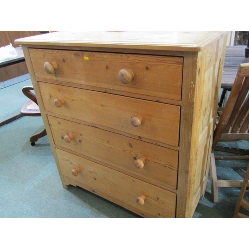 509 - PINE CHEST, stripped pine 4 drawer chest with turned wood handles, 94cm width