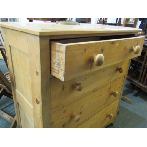 509 - PINE CHEST, stripped pine 4 drawer chest with turned wood handles, 94cm width