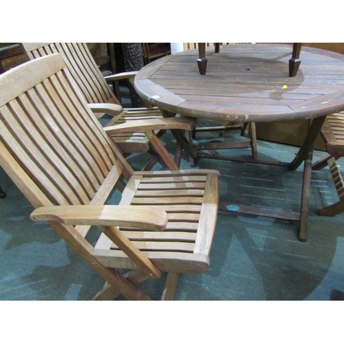 516 - GARDEN FURNITURE, Alexander Rose teak folding circular table, together with 2 matching folding armch... 