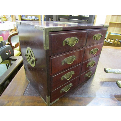 521 - ORIENTAL DESK CHEST/JEWELLERY BOX, mahogany framed and brass bound 4 drawer jewellery box, 36cm widt... 