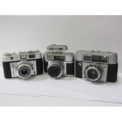 60 - VINTAGE CAMERAS, 12 vintage cameras including a Braun Paxina 29, a Konica Medis, Halina Super 35X, B... 