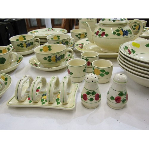 76 - ADAMS TITIAN WARE POTTERY, selection of hand painted tea and dinner ware