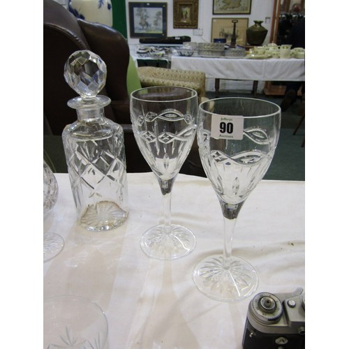 90 - CUT GLASS TABLEWARE, including wines, champagne flutes, 2 decanters, etc