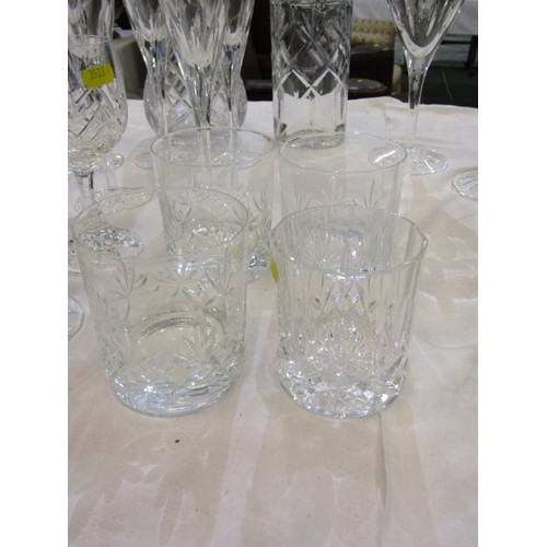 90 - CUT GLASS TABLEWARE, including wines, champagne flutes, 2 decanters, etc