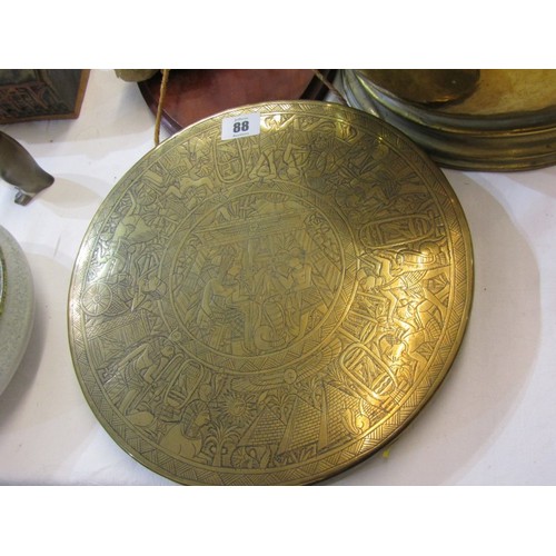 88 - MIDDLE EASTERN BRASS GONG & BEATER with wood plaque, also a brass coal helmet