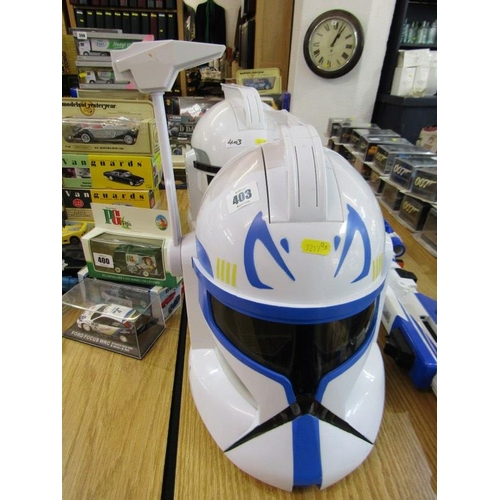 224 - STAR WARS, pair of Storm Trooper helmets together with a laser gun