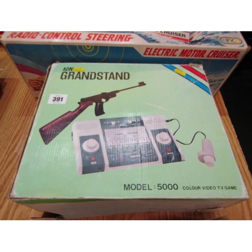 234 - VINTAGE TOYS, boxed Electric Motor Cruiser by Einco, boxed Amstrad Grandstand model 5000 colour vide... 