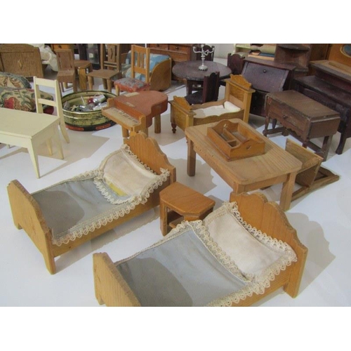 219 - DOLLS HOUSE FURNITURE, large selection of dolls house furniture including beds, wardrobes, sideboard... 