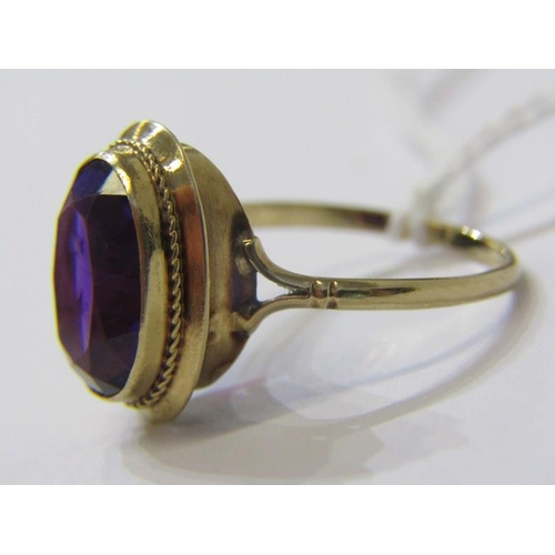 281A - AMETHYST RING, 9ct yellow gold ring, set a large oval cushion cut amethsyt, size U