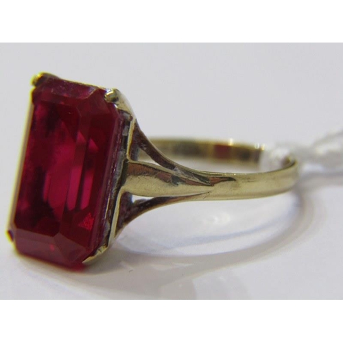 282A - RED STONE DRESS RING, 9ct yellow gold ring, set an emerald cut red stone, size I