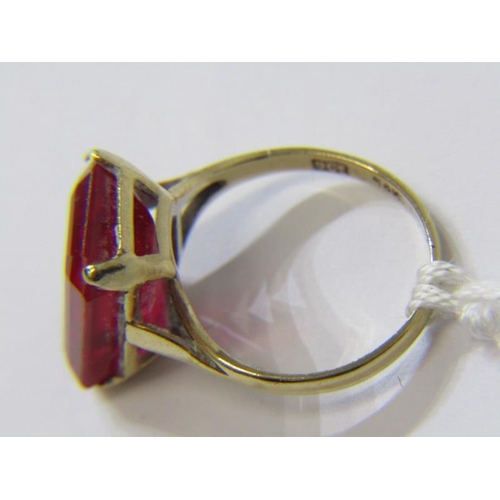 282A - RED STONE DRESS RING, 9ct yellow gold ring, set an emerald cut red stone, size I