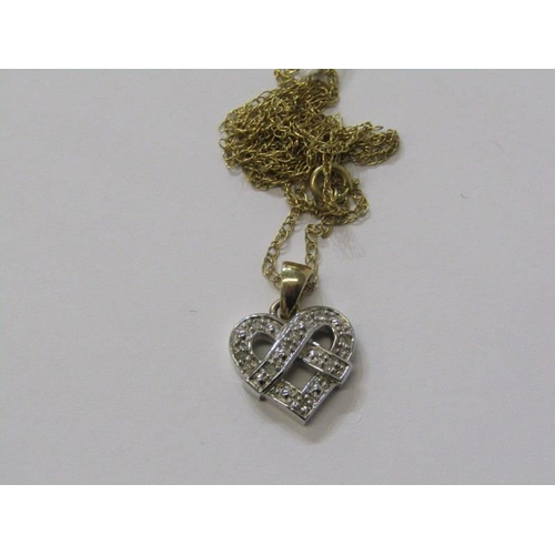 283 - GOLD PENDANT ON FINE LINK NECKLACE, 9ct white gold heart shaped pendant on a yellow gold bale, on 18... 