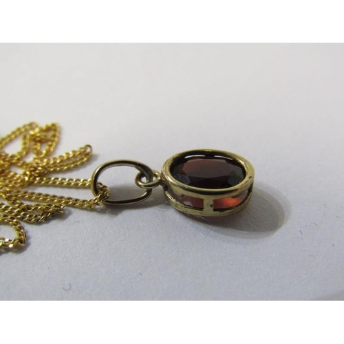 287A - GARNET PENDANT, oval garnet in 9ct gold setting, on a 9ct 16