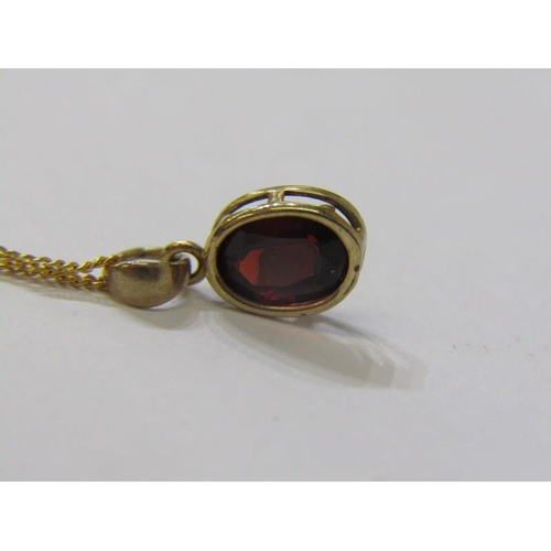 287A - GARNET PENDANT, oval garnet in 9ct gold setting, on a 9ct 16