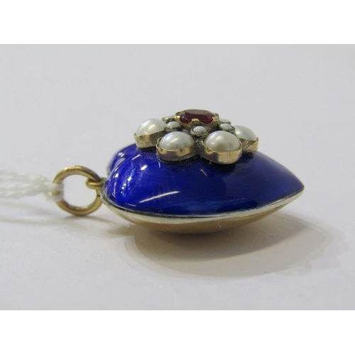 291 - LOCKET, enamel and gold heart form locket, set a cluster of pearls, surrounding a central ruby