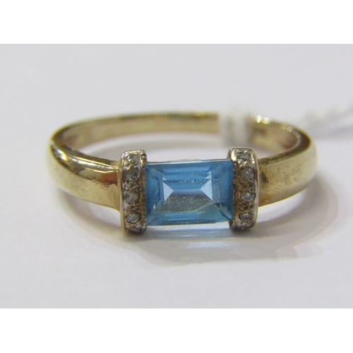 301 - TOPAZ & DIAMOND RING, 9ct yellow gold ring with central rectangular cut topaz with diamond shoulders... 