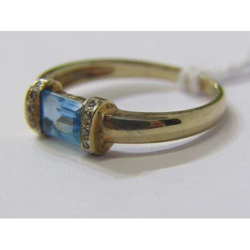 301 - TOPAZ & DIAMOND RING, 9ct yellow gold ring with central rectangular cut topaz with diamond shoulders... 