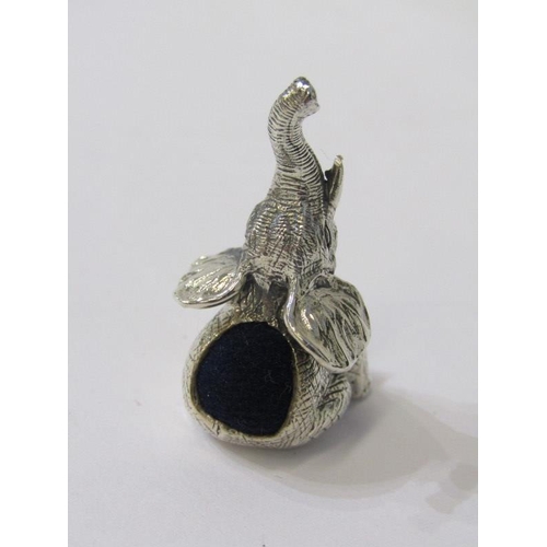 326 - NOVELTY PIN CUSHION, sterling silver novelty pin cushion in the form of a seated elephant