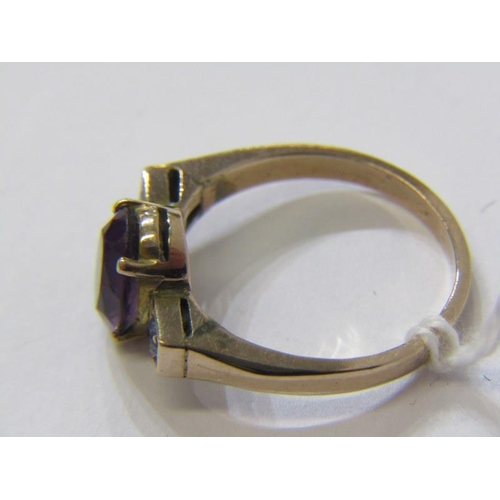 336 - AMETHYST RING, 9ct yellow gold ring set an oval amethyst with a pair of blue sapphires to either sid... 