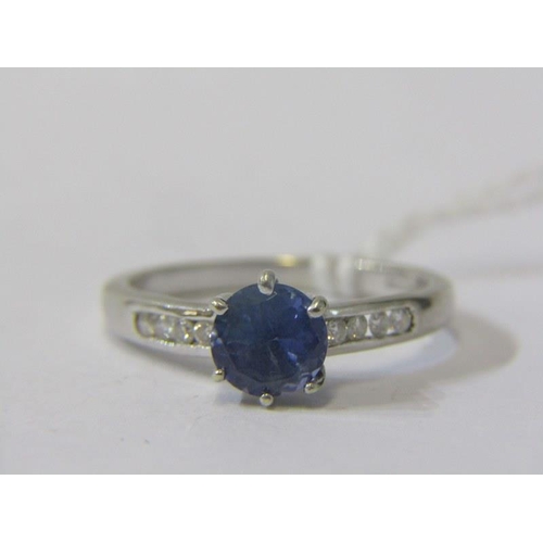 338 - DIAMOND & BLUE STONE DRESS RING, 9ct white gold ring, set with a central circular blue stone possibl... 