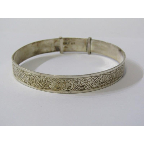 347 - SILVER BANGLES, hinged silver bangle with foliate decoration, an expanding silver bangle together wi... 