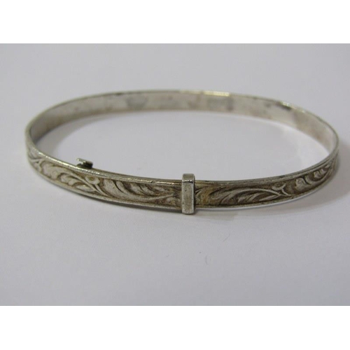 347 - SILVER BANGLES, hinged silver bangle with foliate decoration, an expanding silver bangle together wi... 