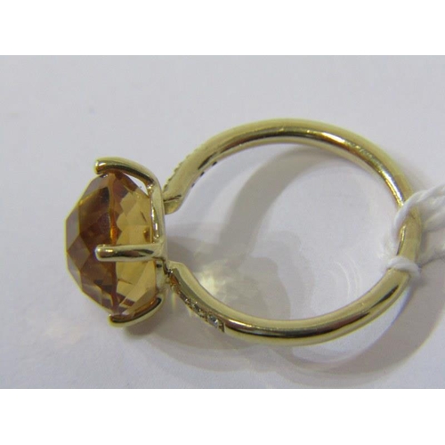 366 - CITRINE & DIAMOND RING, large circular citrine set on a yellow gold band with diamond shoulders, siz... 