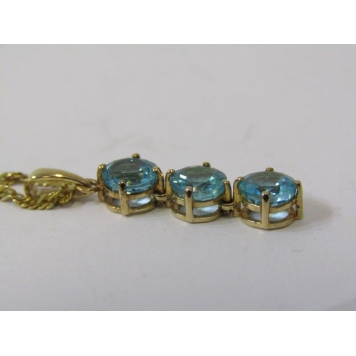 376 - GOLD PENDANT on NECKLACE, 9ct gold pendant set 3 stones, possibly blue topaz, on a fancy 9ct gold 24... 