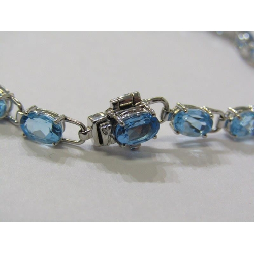 380 - QUALITY BLUE TOPAZ BRACELET, set in 18ct white gold, 7