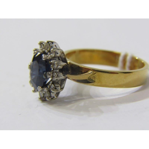 401 - SAPPHIRE & DIAMOND CLUSTER RING, 18ct yellow gold ring, set a large oval sapphire, set a cluster of ... 