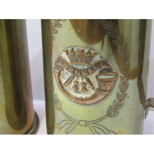 428 - TRENCH ART, pair of floral engraved and Duke of Cornwall Light Infantry decorated shell case jugs, 2... 