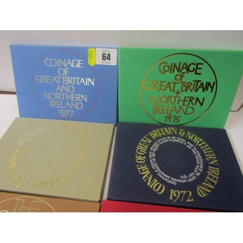 64 - 1972-1977 Coinage of Great Britain & Northern Ireland coin sets in Royal Mint display cases