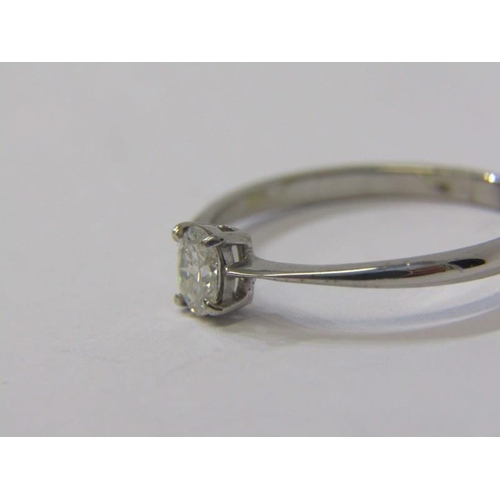 135 - 9ct WHITE GOLD DIAMOND SOILITAIRE RING, principal oval cut diamond in excess of 0.3 carat, size M