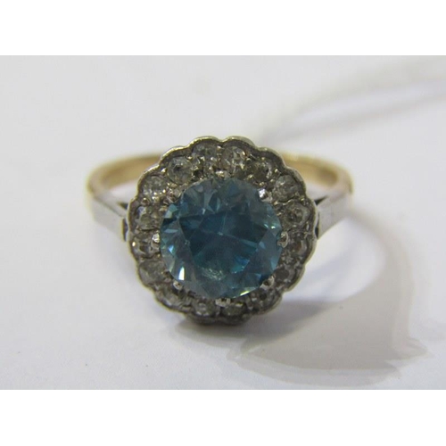 137 - 18ct GOLD & PLATINUM BLUE STONE & DIAMOND RING, principal large brilliant cut blue stone, possibly b... 