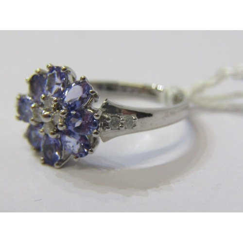 139 - 14ct WHITE GOLD TANZANITE & DIAMOND CLUSTER RING, 8 well matched tanzanite stones, set with accent b... 