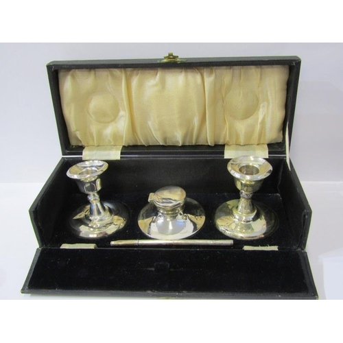 39 - BOXED SILVER WRITING SET, comprising circular ink well, pair of weighted dwarf candlesticks, (1 a/f)... 