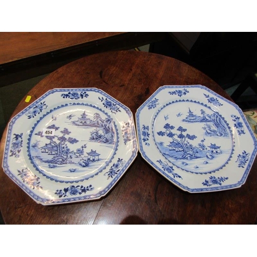 454 - CHINESE UNDERGLAZE BLUE CHARGERS, a pair of Chinese octagonal form charges decorated landscapes with... 