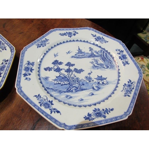 454 - CHINESE UNDERGLAZE BLUE CHARGERS, a pair of Chinese octagonal form charges decorated landscapes with... 