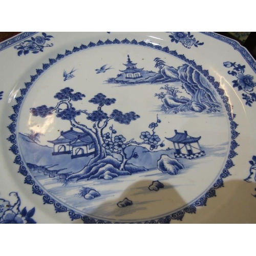 454 - CHINESE UNDERGLAZE BLUE CHARGERS, a pair of Chinese octagonal form charges decorated landscapes with... 