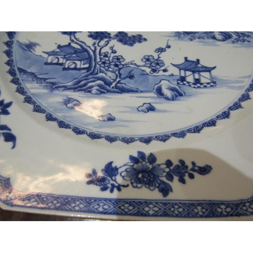 454 - CHINESE UNDERGLAZE BLUE CHARGERS, a pair of Chinese octagonal form charges decorated landscapes with... 