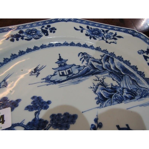 454 - CHINESE UNDERGLAZE BLUE CHARGERS, a pair of Chinese octagonal form charges decorated landscapes with... 