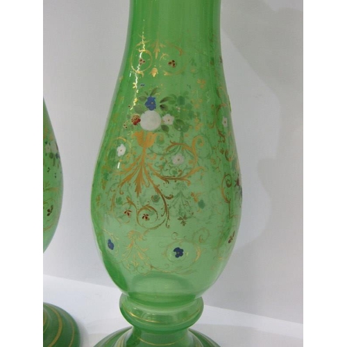 456 - VICTORIAN GLASS VASES,  pair of green glass vases with enameled decoration 36cms height